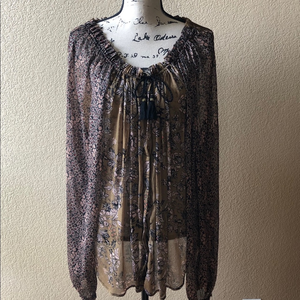Free People sheer floral blouse.